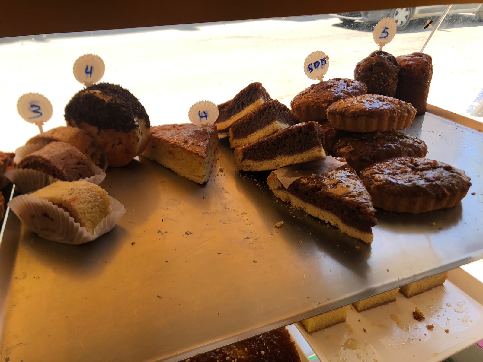 Assorted homemade cakes and slices on the counter